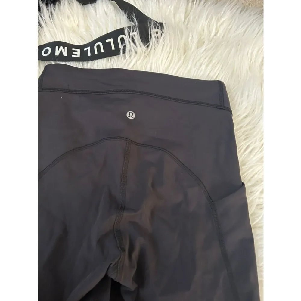 Lululemon Black Active Leggings size 4 good preowned condition no signs of wear